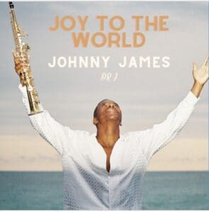 A poster on Joy to the world Johnny James with sea in the back