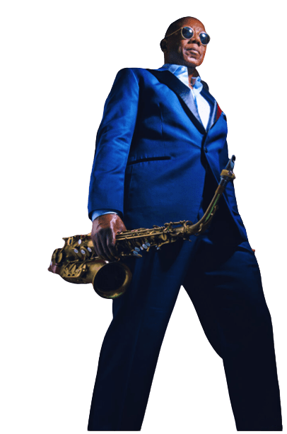 A man in a blue suit holding a saxophone.